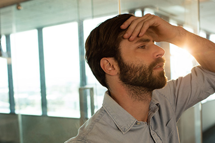 Rentals Gone Wrong: Was It Less-Than-Stellar Location? Or Problematic Management? Sad businessman leaning on glass