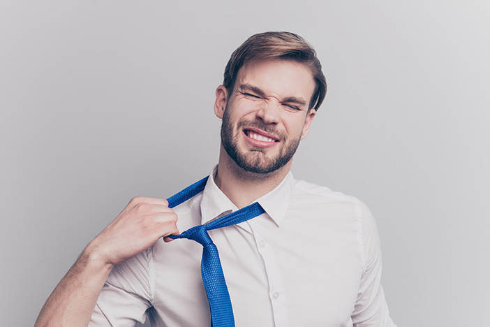 3 Things I Learned From My First Hard Money Deal Close up portrait of exhausted frustrated stressed handsome sad unhappy upset entrepreneur trying to take off uncomfortable blue tie formal wear isolated on gray background copy-space