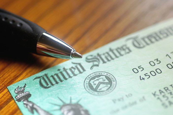 Stimulus Checks: How Much Will They Be? Who Is Eligible? (Coronavirus Stimulus Package Q&A) Paper check from the United States Treasury