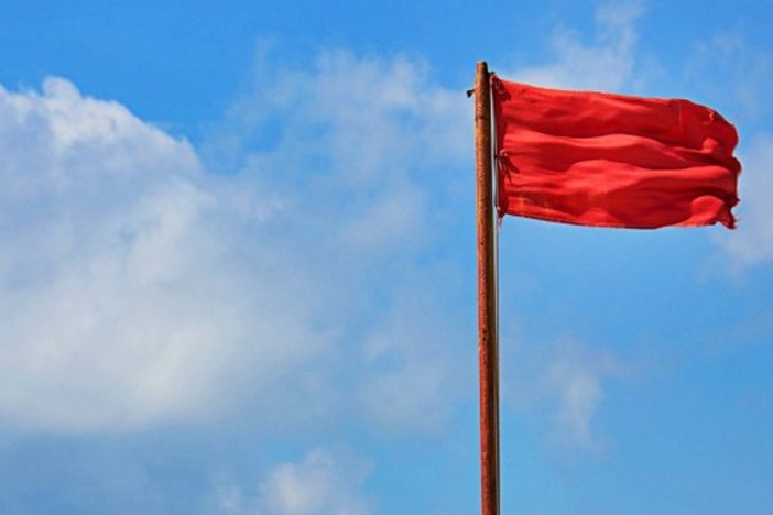 10 Glaring Red Flags That Indicate Your “Great Deal” May Be a Costly Scam turnkey-red-flag