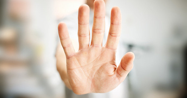 Dear Landlords, Why Are You Still Personally Collecting Rent? (There Are MUCH Better Ways!) closeup of man showing stop gesture with his hand