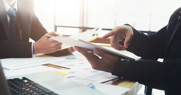 How to Negotiate: 7 Real Estate Negotiation Tips Young startups businessmen teamwork brainstorming meeting to discuss plan startup project.