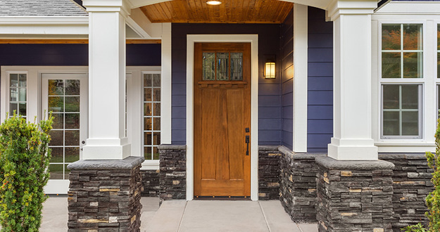 6 House Features That Take Buyers From “Not Sure” to “I’ll Take It!” New Luxury Home Exterior Detail: New House Front Door and Covere