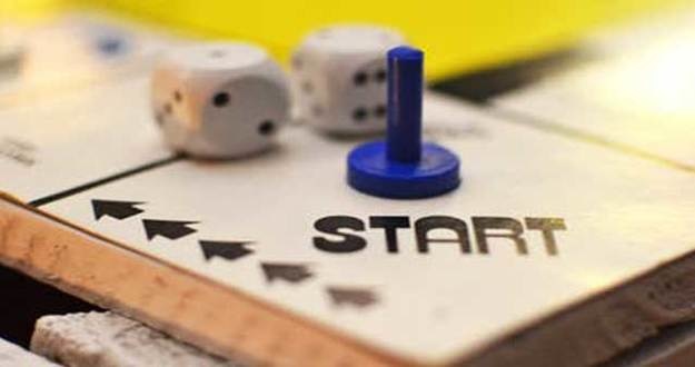 5 Achievable Tasks for Real Estate Newbies Feeling Lost & Overwhelmed game board with dice and game piece at start